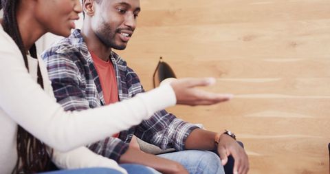 Couple Discussing Papers Together at Home