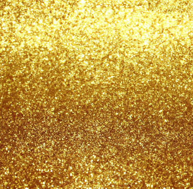 Beautiful abstract background showcasing shimmering golden glitter. Perfect for use in invitations, festive decorations, holiday cards, party invitations, or any creative design projects requiring a touch of luxury and glamour.