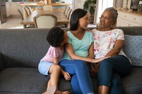 Multigenerational Family Sharing Moments in Cozy Home Interior