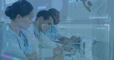 Diverse medical team collaborating over digital charts and maps during clinical briefing