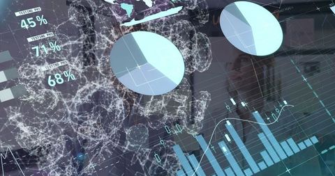 Professionals Analyzing Data on Digital Screens in Office Environment