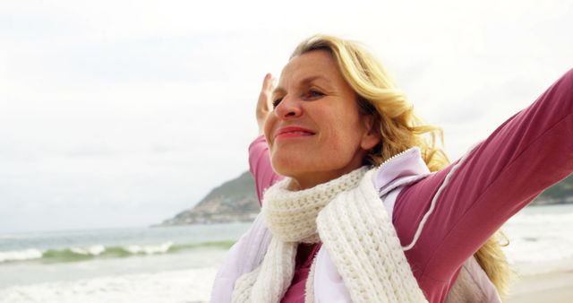 Joyful Woman Embracing outdoors by sea - Download Free Stock Images Pikwizard.com