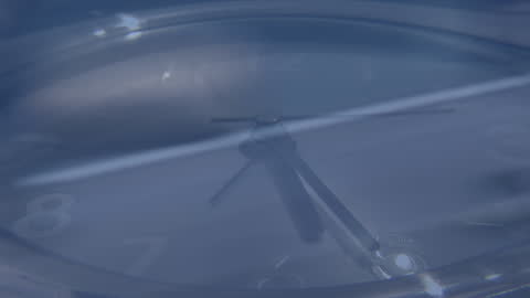 Time Passing with Falling Dominoes and Clock Imagery