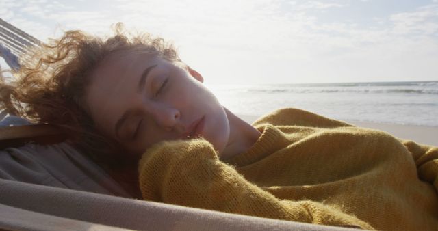 Woman Wearing Yellow Sweater Relaxing on Beach - Download Free Stock Images Pikwizard.com