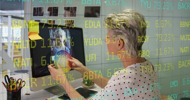 Senior Woman Analyzing Stock Market Data on Computer Screen - Download Free Stock Photos Pikwizard.com