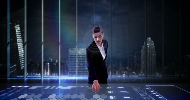Businesswoman in a dark office interacting with a holographic touchscreen interface. A city's skyscrapers are visible through large windows in the background, suggesting a high-tech working environment. Perfect for illustrating concepts related to advanced technology, corporate future, virtual data analytics, modern office settings, and innovative business solutions.