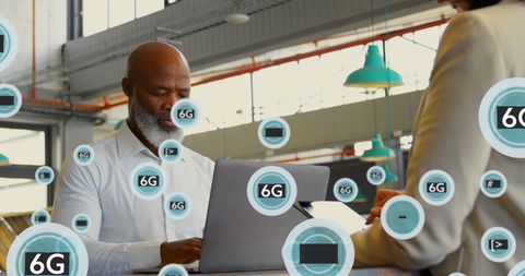 Coworkers using modern tech with 6g digital overlay