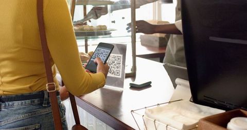 Contactless Payment via Smartphone QR Code in Cafe