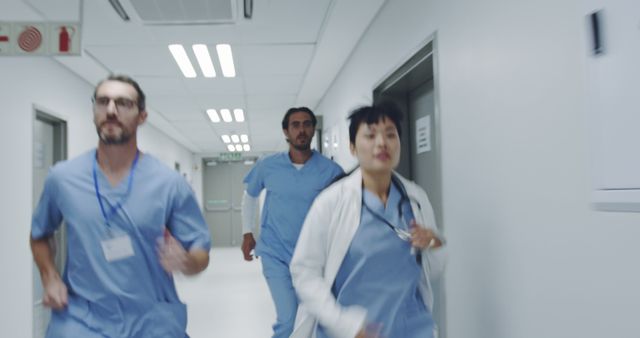 Medical Team Running in Hospital Corridor during Emergency Case - Download Free Stock Images Pikwizard.com