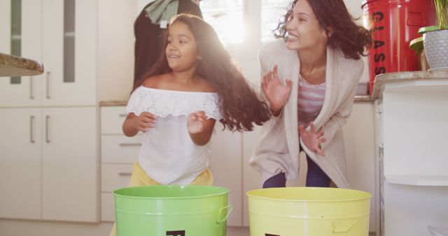 Hispanic parents and daughter teaching segregating plastic trash - Download Free Stock Photos Pikwizard.com
