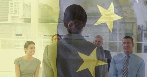 Female executive leading boardroom presentation with eu star overlay, corporate leadership