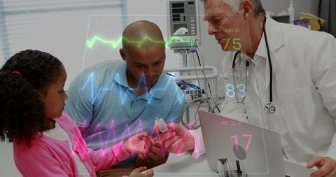 Doctor Assists Father and Child with Oximeter and Vitals Monitoring