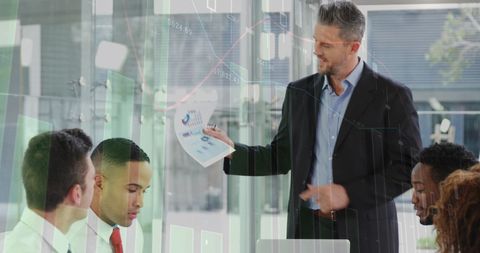 Business Team Analyzing Growth with Diverse Manager Distributing Reports