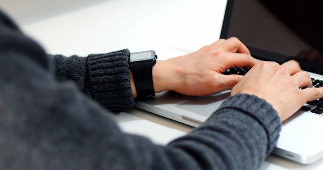 Person typing on laptop keyboard in office setting - Download Free Stock Images Pikwizard.com