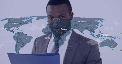 Executive scanning documents while overlaying global data map with digital analytics