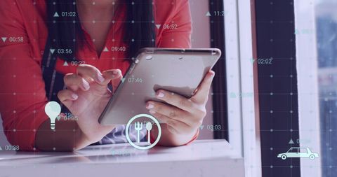 Data Processing by Woman Using Tablet in Retail Setting