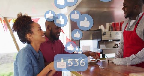 Young Couple Ordering at Food Stand with Social Media Likes Overlay
