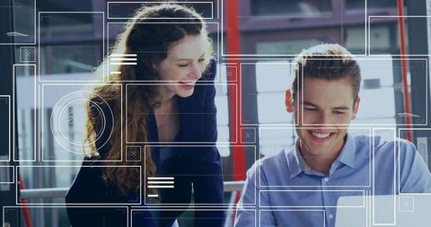 Business Professionals Engaged in Creative Collaboration with Digital Technology