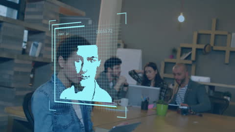 Facial Recognition Technology Analyzing Modern Office Workforce