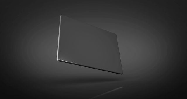 Displaying a sleek, black laptop levitating against a dark background, this image highlights modern technology and minimalist design. Perfect for tech advertising, website headers, product presentations, and innovation-themed digital content.