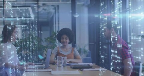 Team Collaborating in Modern Office Environment With Holographic Elements