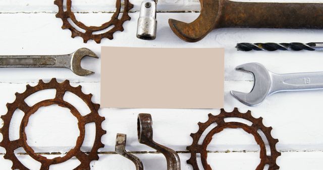 Vintage Rusty Tools and Gears on White Wooden Background - Download Free Stock Images Pikwizard.com