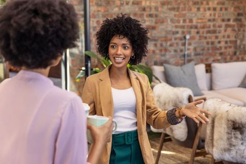 Casual Work Break with Diverse Coworkers in Urban Lounge