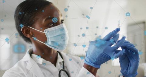 Black female doctor preparing vaccine syringe wearing mask and gloves with medical icons