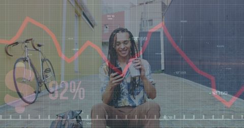 Man Analyzing Financial Data on Smartphone Outdoors