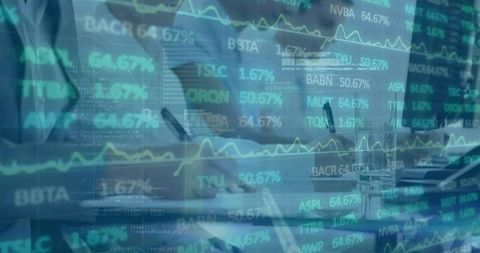 Analysts examining stock market charts in modern conference room