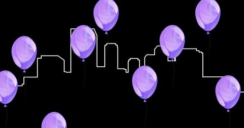 Purple Balloons Floating in Silhouette of Cityscape at Night