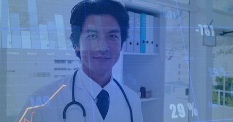 Standing doctor wearing white coat and stethoscope showing ar data overlays in clinic