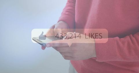 Person Using Smartphone with Overlay of Growing Likes Count