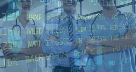 Doctors Smiling with Overlay of Stock Market Data Reflections