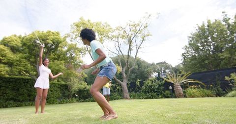 Family Seesawing Emotion of Activity Outside Enjoying: Lively Backyard Scenery Inspiring