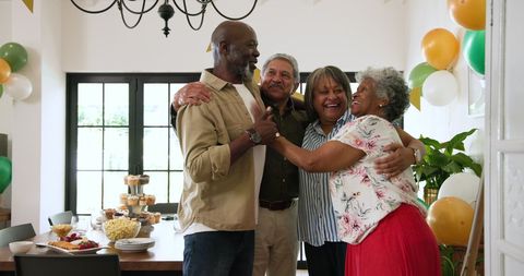 Joyful Senior Friends Celebrating Retirement Party Together