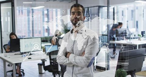 Businessman Standing In Modern Office With Digital World Map Overlay