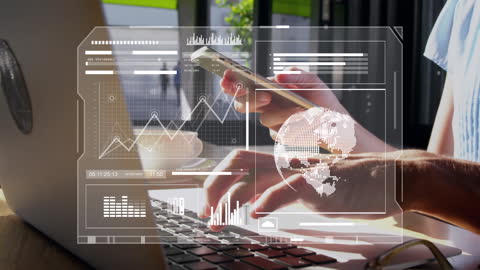 Woman Using Laptop with Futuristic Data Interfaces