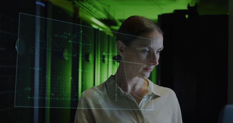 It technician analyzing data with futuristic interface