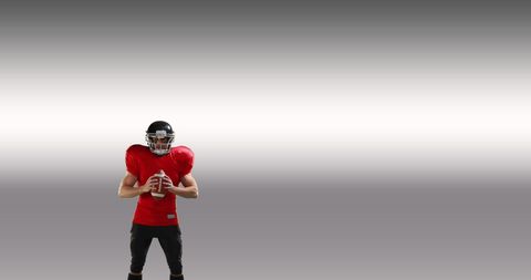 Rugby player holding ball celebrating victory