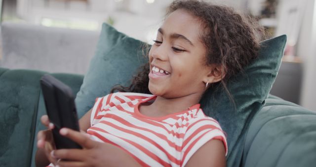 Happy Young Girl Playing Game on Smartphone at Home - Download Free Stock Images Pikwizard.com