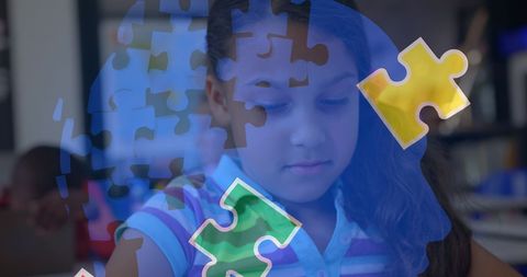 Young girl using tablet with puzzle overlay celebrating autism awareness