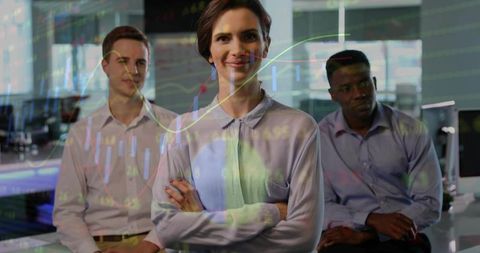 Confident businesswoman leading analytics team with financial charts overlay in office