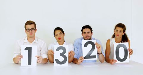 Disappointed Panel Holding Scorecards in Office Setting - Download Free Stock Images Pikwizard.com