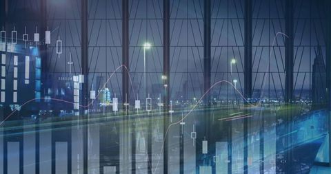 Financial data and cityscape night view with analyzing charts