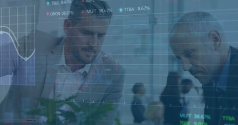 Business professionals analyzing stock market data and trends