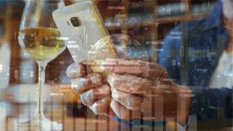 Technological Entrepreneur Networking with Smartphone at Bar