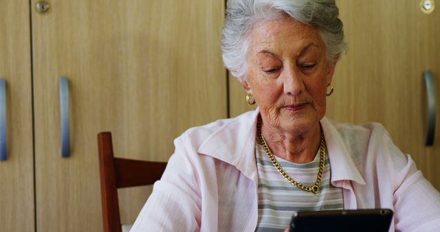 Senior Woman Using Smartphone Indoors - Download Free Stock Images Pikwizard.com