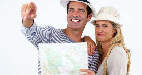 Happy Couple Exploring with Map WhiteBackground