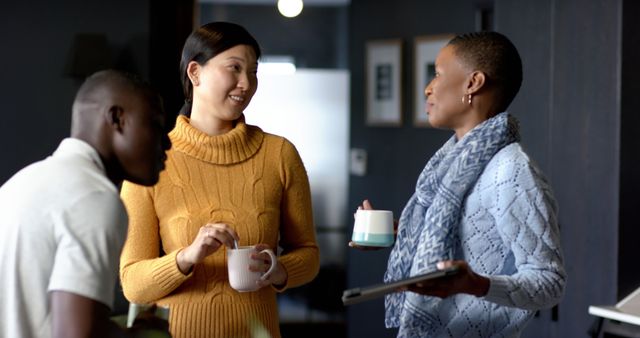 Colleagues Engaging in Friendly Conversation During Coffee Break - Download Free Stock Images Pikwizard.com